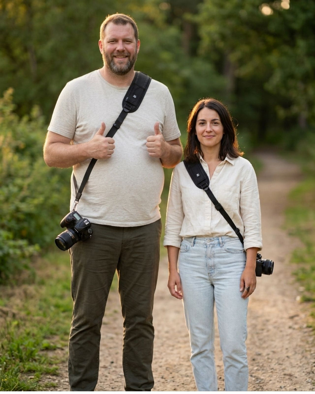 Two photographers wearing HiiGuy camera straps, one in the 32 inch and one in the 44 inch length