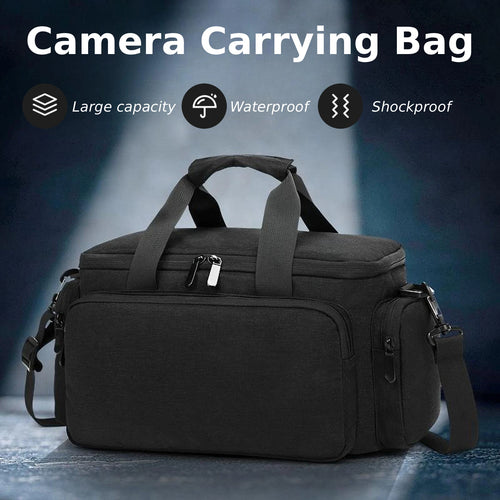 Black rectangular camera carrying bag with two top handles, a front zip pocket and a shoulder strap