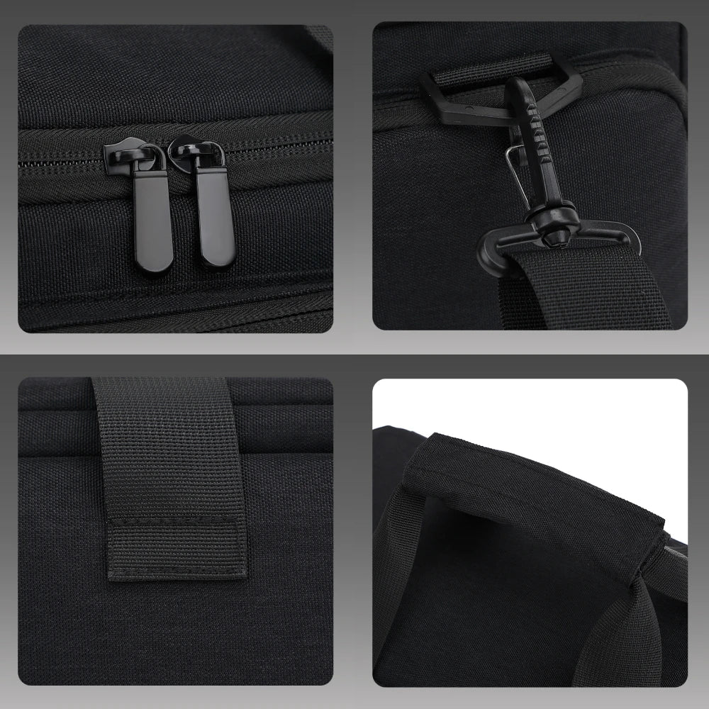 Black rectangular camera carrying bag with two top handles, a front zip pocket and a shoulder strap