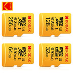Yellow Kodak-branded microSDXC card in retail packaging with an SD adapter, beside 256GB, 128GB, 64GB and 32GB cards