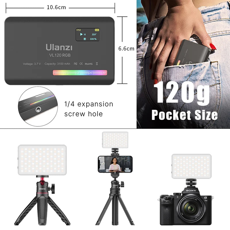 White pocket LED light with a small color screen, shown glowing in rainbow colors, with a diffuser cap, mount and cable
