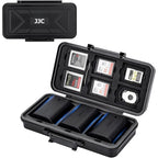 Open black JJC hard case with memory cards held in the lid and three camera batteries in moulded wells below