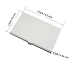 Open black metal card case holding twelve microSD cards in foam-lined slots