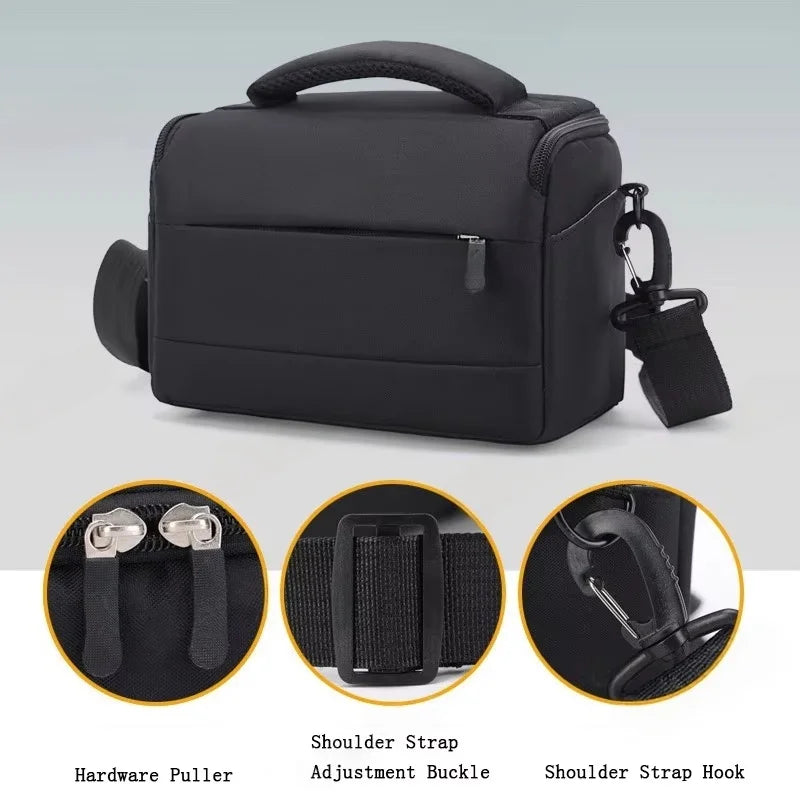Black camera shoulder bag with a padded top handle, a zip front pocket and a clip-on shoulder strap