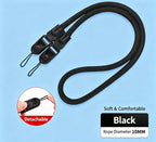 Black braided rope camera strap coiled on a dark surface, with a quick release clip and a cord loop at each end