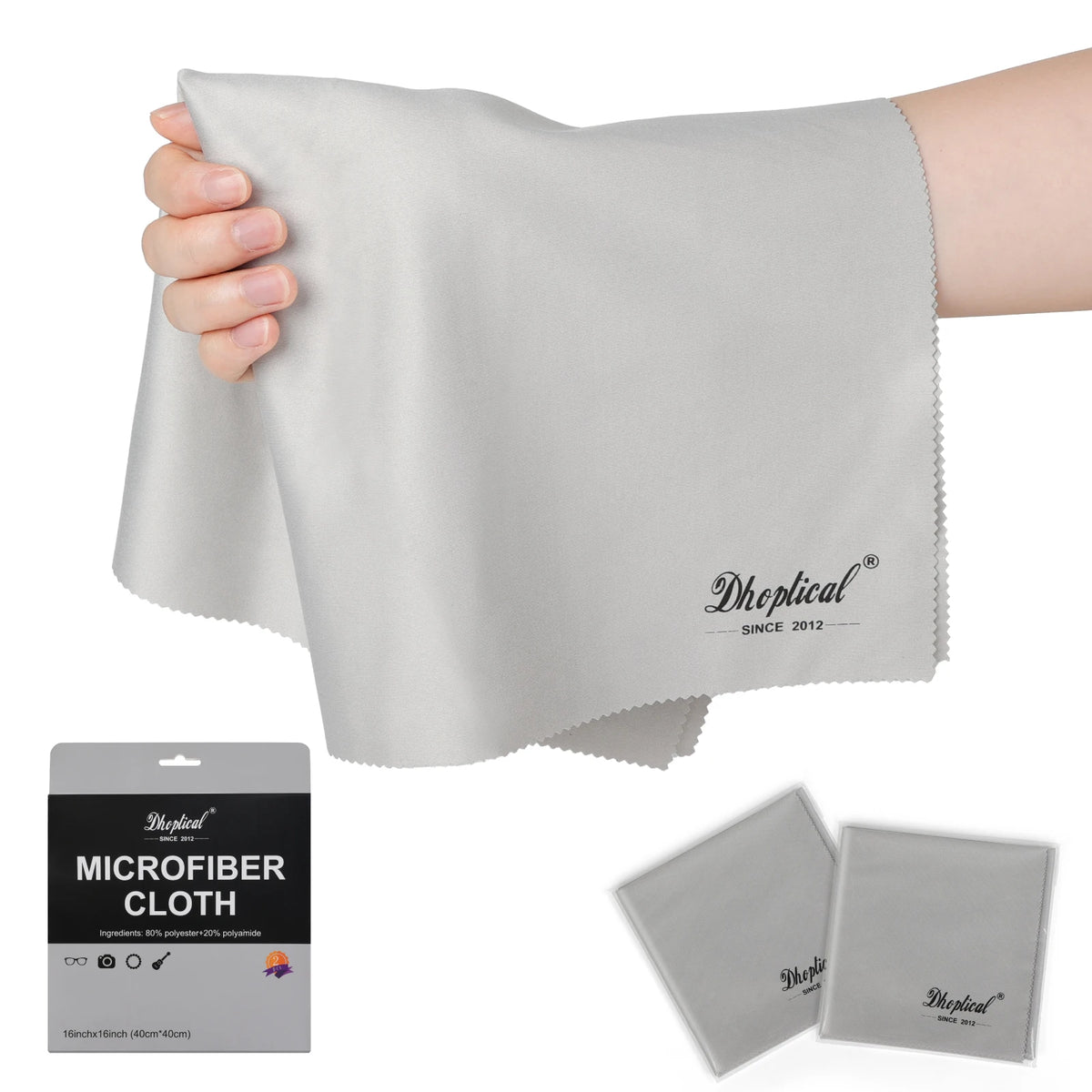 Hand holding a large gray microfiber cloth, with two gray cloths in sleeves and a gray retail package below