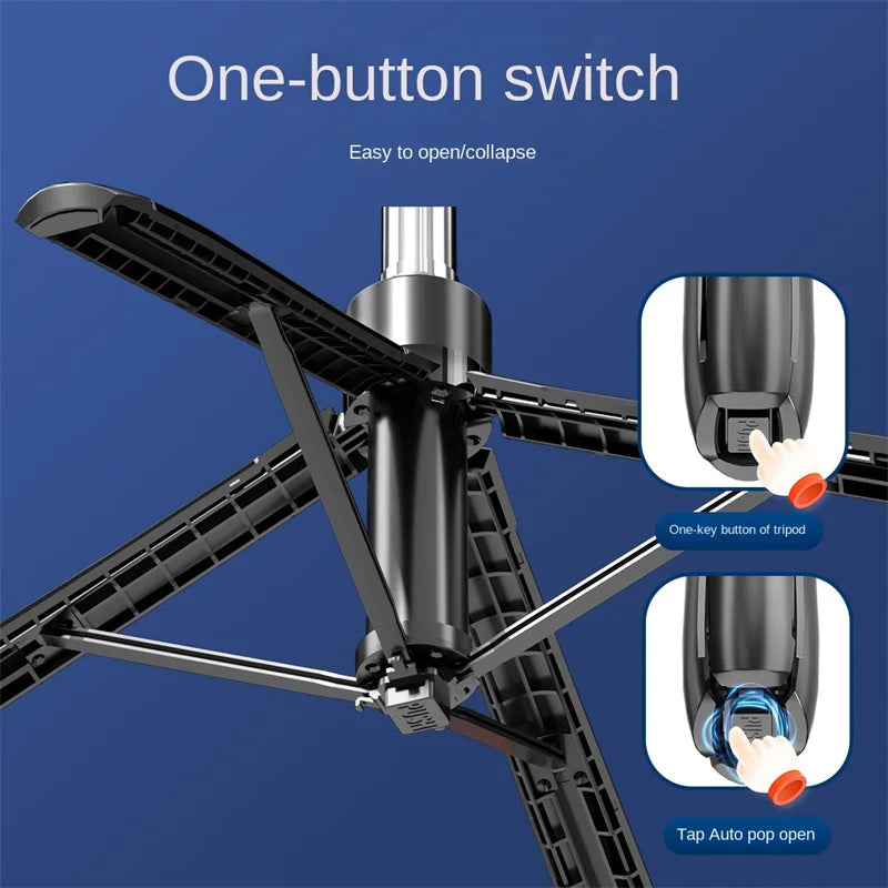 Black selfie stick tripod on a four-leg base holding a phone, with a detachable remote clipped to the pole