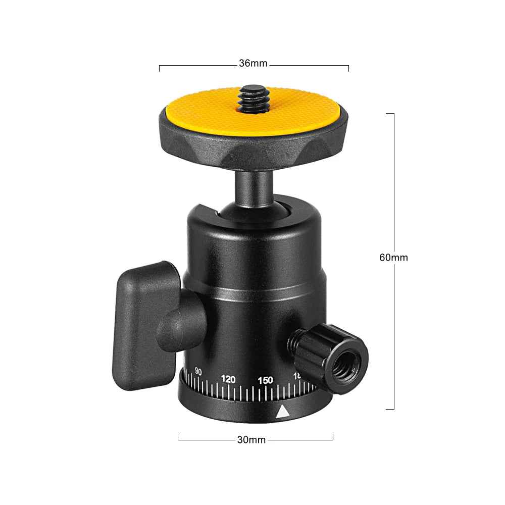 Black mini ball head with an orange rubber top plate, a locking knob and a degree scale, beside a double-nut shoe adapter