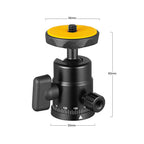 Black mini ball head with an orange rubber top plate, a locking knob and a degree scale, beside a double-nut shoe adapter