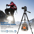 Black tripod with a pan head and long handle, shown with a phone holder, a spare plate, a folded view and a black carry bag
