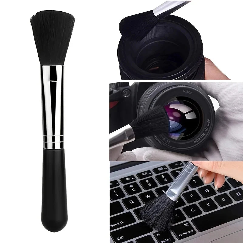 Camera cleaning kit on a shelf: black air blower, lens pen, soft brush, empty spray bottle, cloth and gray drawstring pouch