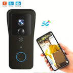White video doorbell with a camera and a ring button, shown with a white plug-in chime and two blue batteries