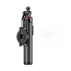 Folded black selfie stick tripod with a screw mount on top, a red ring below the head and a round clip holder on the side