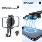 Folded black selfie stick tripod with a screw mount on top, a red ring below the head and a round clip holder on the side
