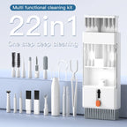 Two slim cleaning tool boxes, one black and one white, with brush bases and small tools stored behind clear covers