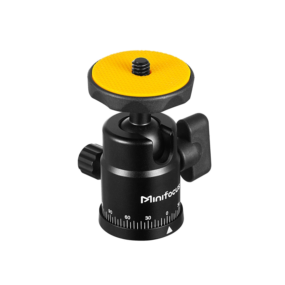 Black mini ball head with an orange rubber top plate, a locking knob and a degree scale, beside a double-nut shoe adapter