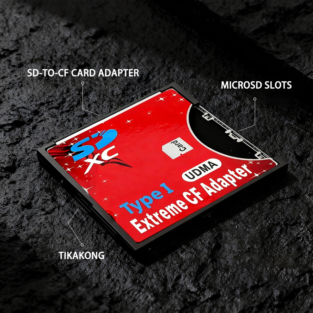 Red SD to CompactFlash Type I adapter lying on dark stone, with callout lines marking its microSD slots