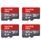 Four red and grey SanDisk Ultra microSD cards marked 256GB, 32GB, 64GB and 128GB