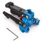 Folding three-leg monopod base with blue joints, a red locking ring and a screw stud, with small views of it under a monopod