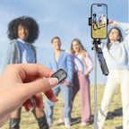 Black selfie stick tripod holding a phone between two small lights, shown extended on its legs, folded, and turned by hand