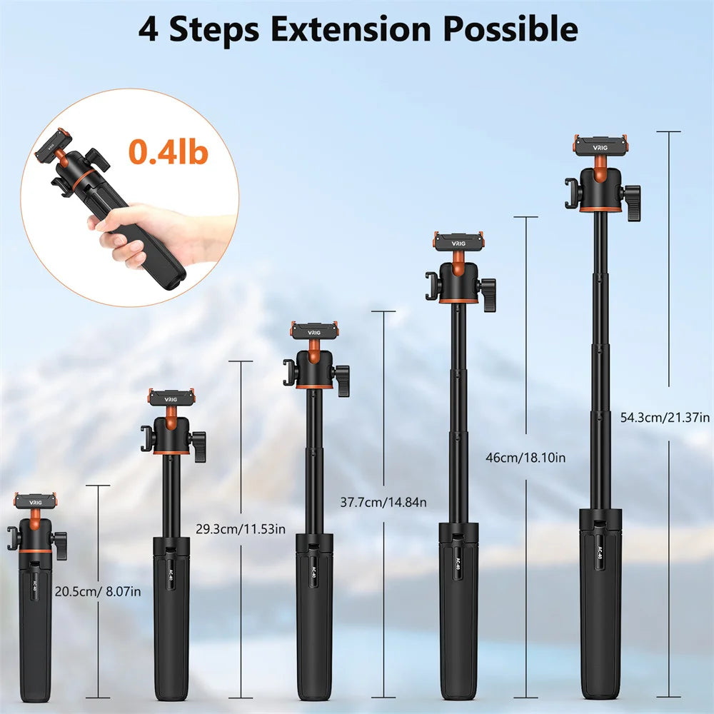 Black and orange Vrig stand holding an action camera on a magnetic mount, as a tripod and as a handheld grip with a light