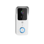 White video doorbell with a camera and a ring button, shown with a white plug-in chime and two blue batteries