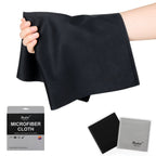 Hand holding a large black microfiber cloth, with a black and a gray cloth in sleeves and a gray retail package below