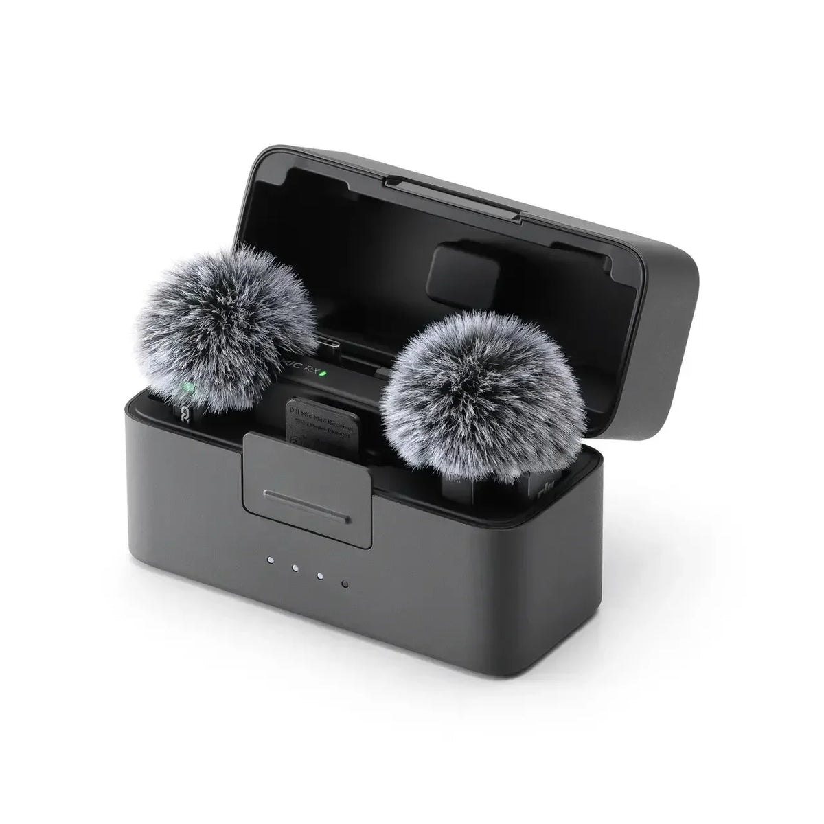 Black DJI Mic Mini charging case open, holding two small transmitters with gray furry windscreens