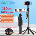 Black phone tripod extended on its legs with a smartphone on top and a remote on the pole, plus a folded one beside it