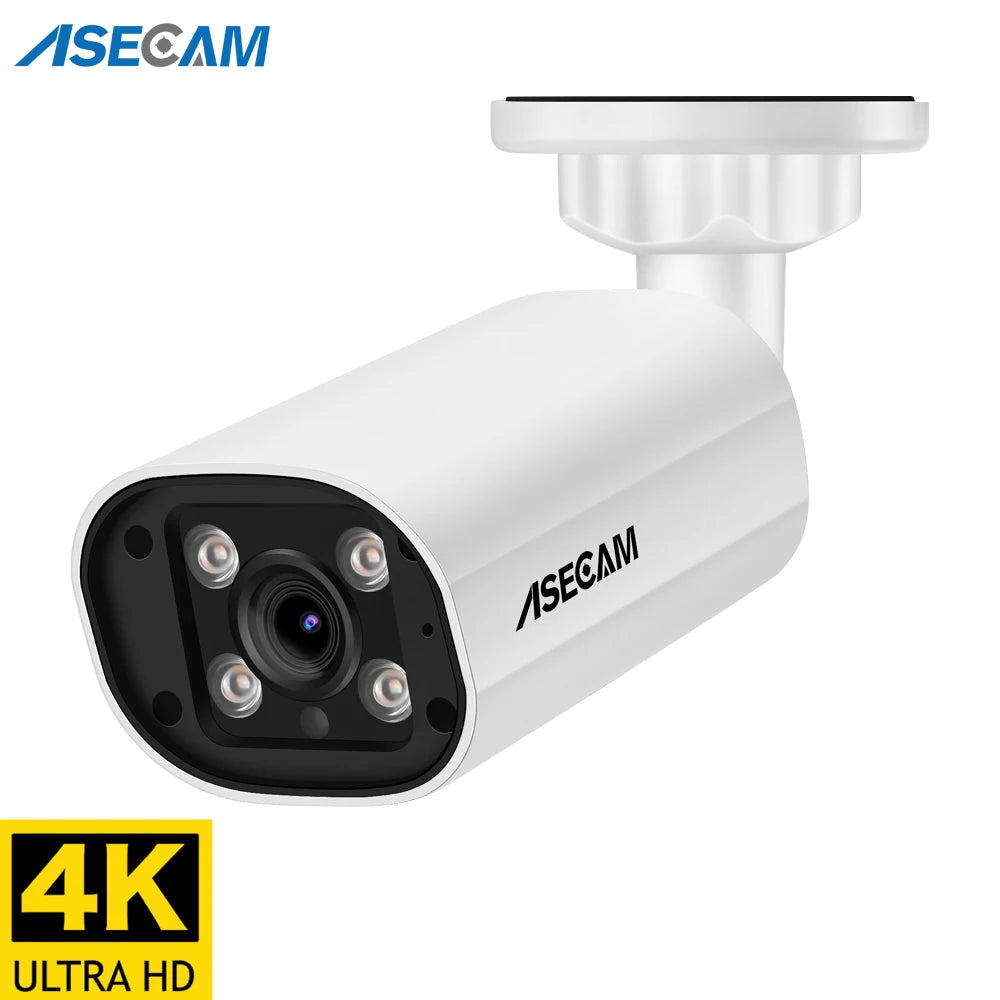 White Asecam bullet security camera with four lights around the lens, on a white wall mount