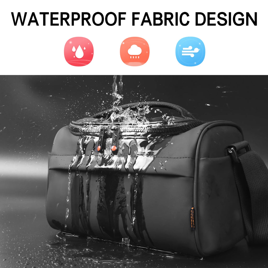 Black camera shoulder bag open to an orange padded interior, a small lens inside and a hand lowering a zoom lens in