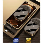Two black clip-on mics with furry windscreens, a small receiver with a headphone plug, a cable and the box