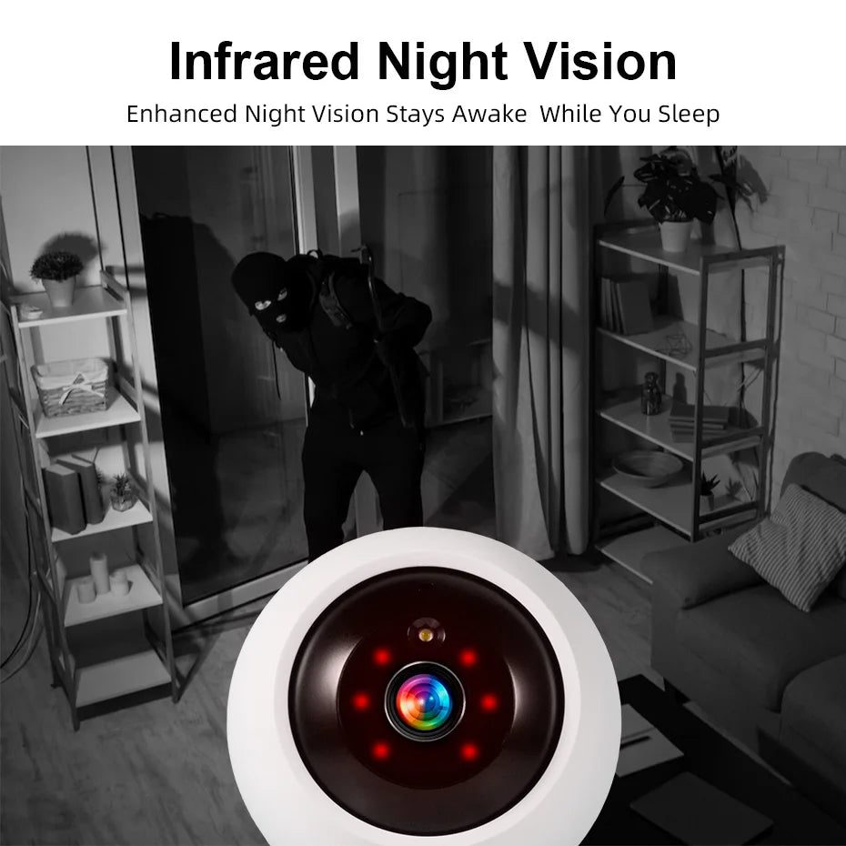 White Fuers pan-tilt indoor camera beside a hand holding a phone that shows a sleeping baby in the app
