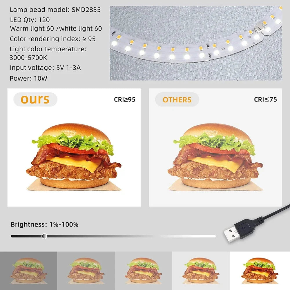 Black Lightdow cube light box with a ring of LEDs inside, six rolled color backdrops and the box folded flat with a handle