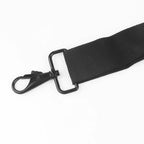 Black adjustable shoulder strap with a wide padded shoulder pad and a swivel snap hook at each end