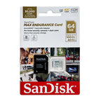 A SanDisk Extreme Pro 128GB microSD card and a SanDisk Extreme card in a black SD adapter on a pink background