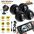 Four round black mini cameras with a magnetic stand and USB cable, next to a phone showing a street view in the app