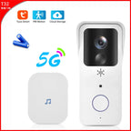 White video doorbell with a camera and a ring button, shown with a white plug-in chime and two blue batteries