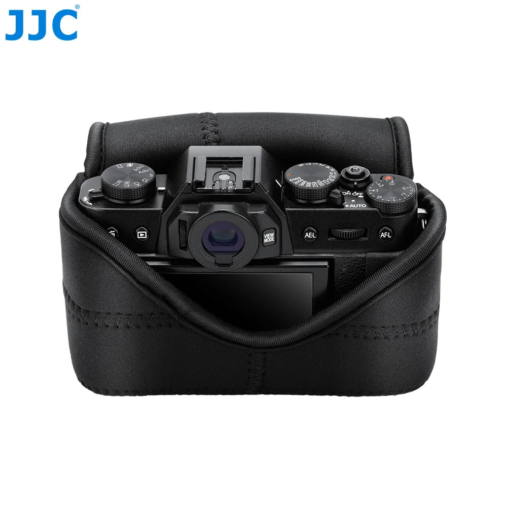 Contoured black soft camera pouch with a zip around the body and two small loops, shown closed on a white background