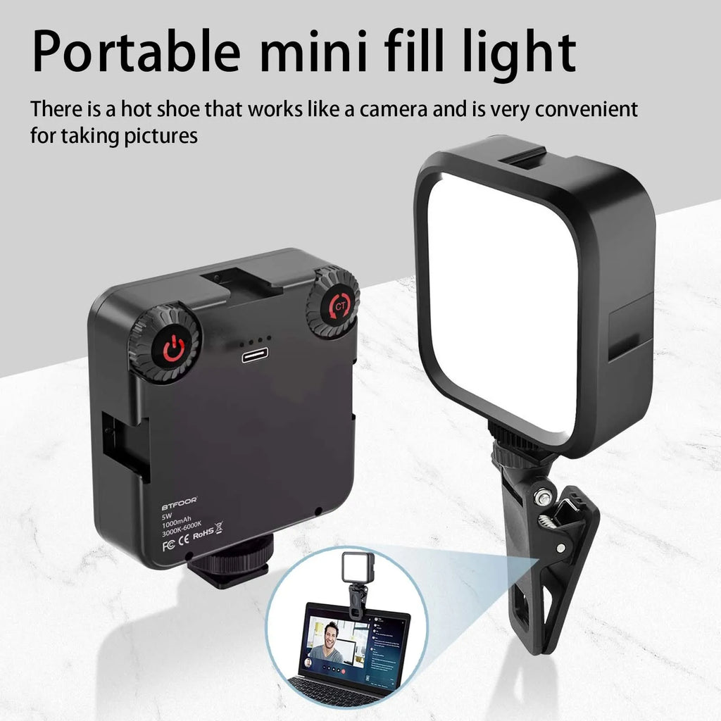 Square black LED panel light, front and back, with two dials, a phone clip, a cold shoe mount and a USB-C cable
